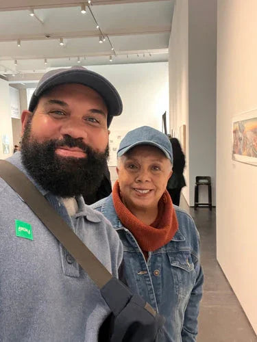 Jason Hodges with his mother, artist Antionette Simmons Hodges