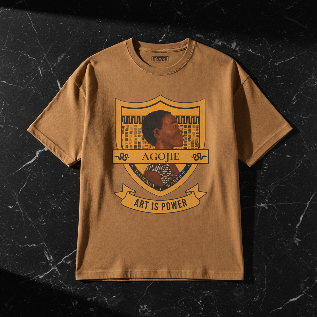 Dahomey Warrior toast tee flatlay on black marble — detailed Agojie print — Art Is Power Vol. I | Inkwell Fine Art Prints