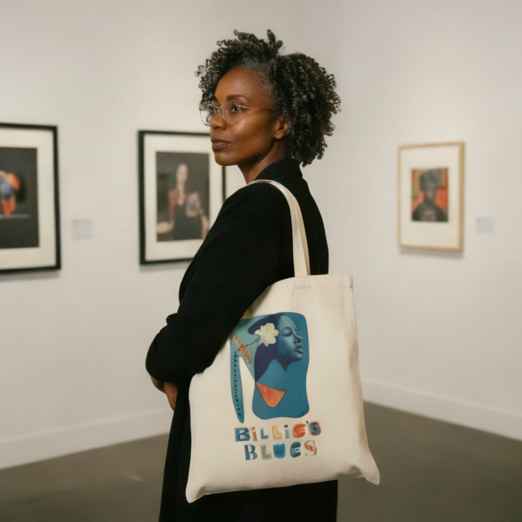 Black woman in art gallery carrying the Billie's Blues natural canvas tote bag — Art Is Power Vol. I by Inkwell Fine Art Prints