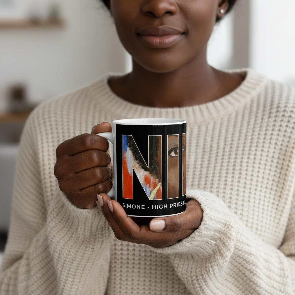 Black woman holding the Nina Simone ceramic mug — Art Is Power Vol. I by Inkwell Fine Art Prints