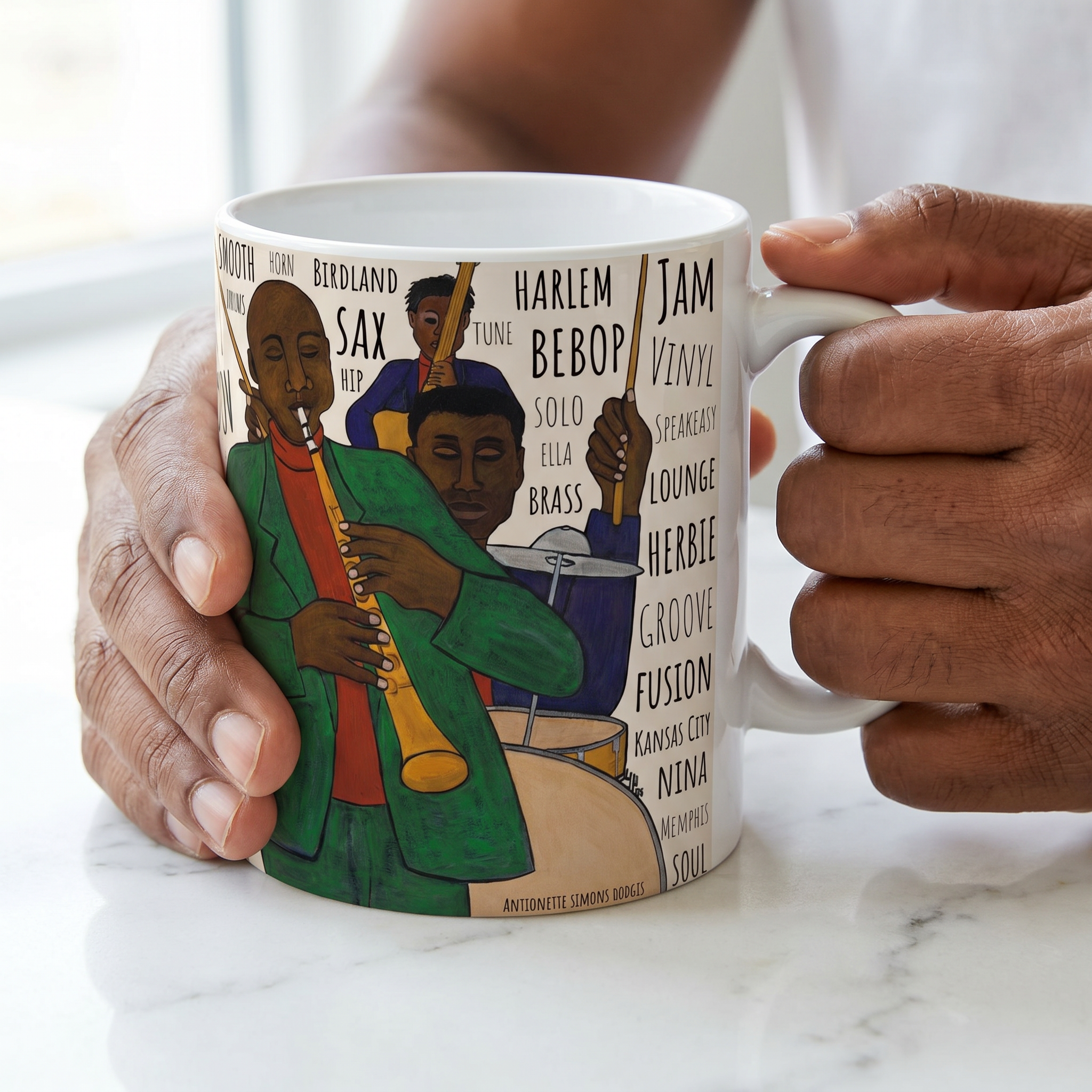Hands holding Battle of the Jazz Bands mug in cream — Black art jazz ceramic coffee cup lifestyle