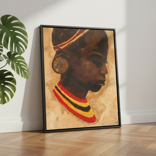 Mariama framed canvas print black frame leaning on herringbone floor beside a monstera plant — African girl portrait art