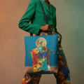 Spiritual Mother Earth Art Tote Bag worn in front of body showing teal design and size