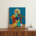 Mother Earth canvas print flat on sideboard with overhead books — Afrocentric spiritual Black art