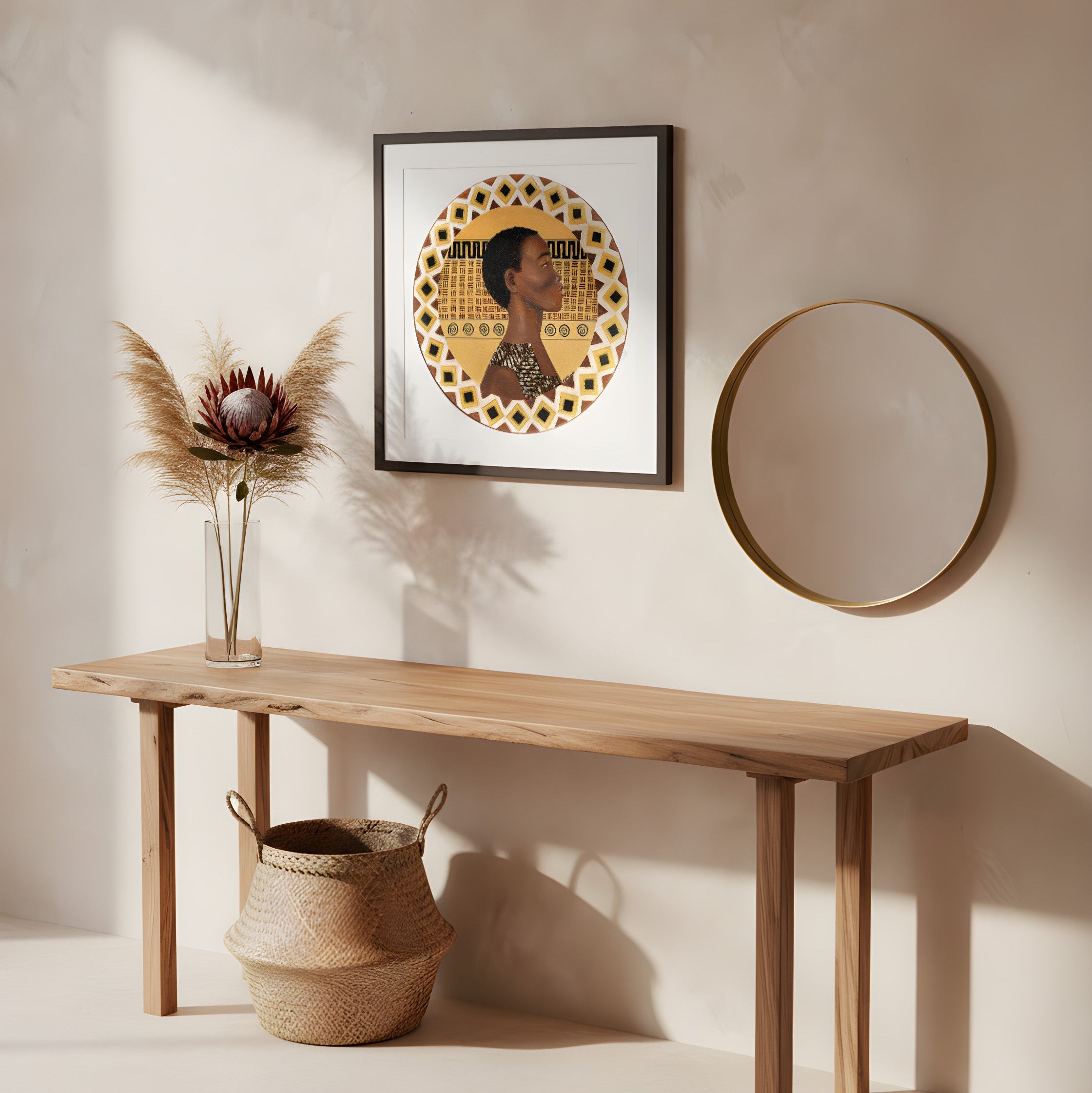 Wooden bench with decorative items against a light wall with a framed female african warrior artwork and round mirror.
