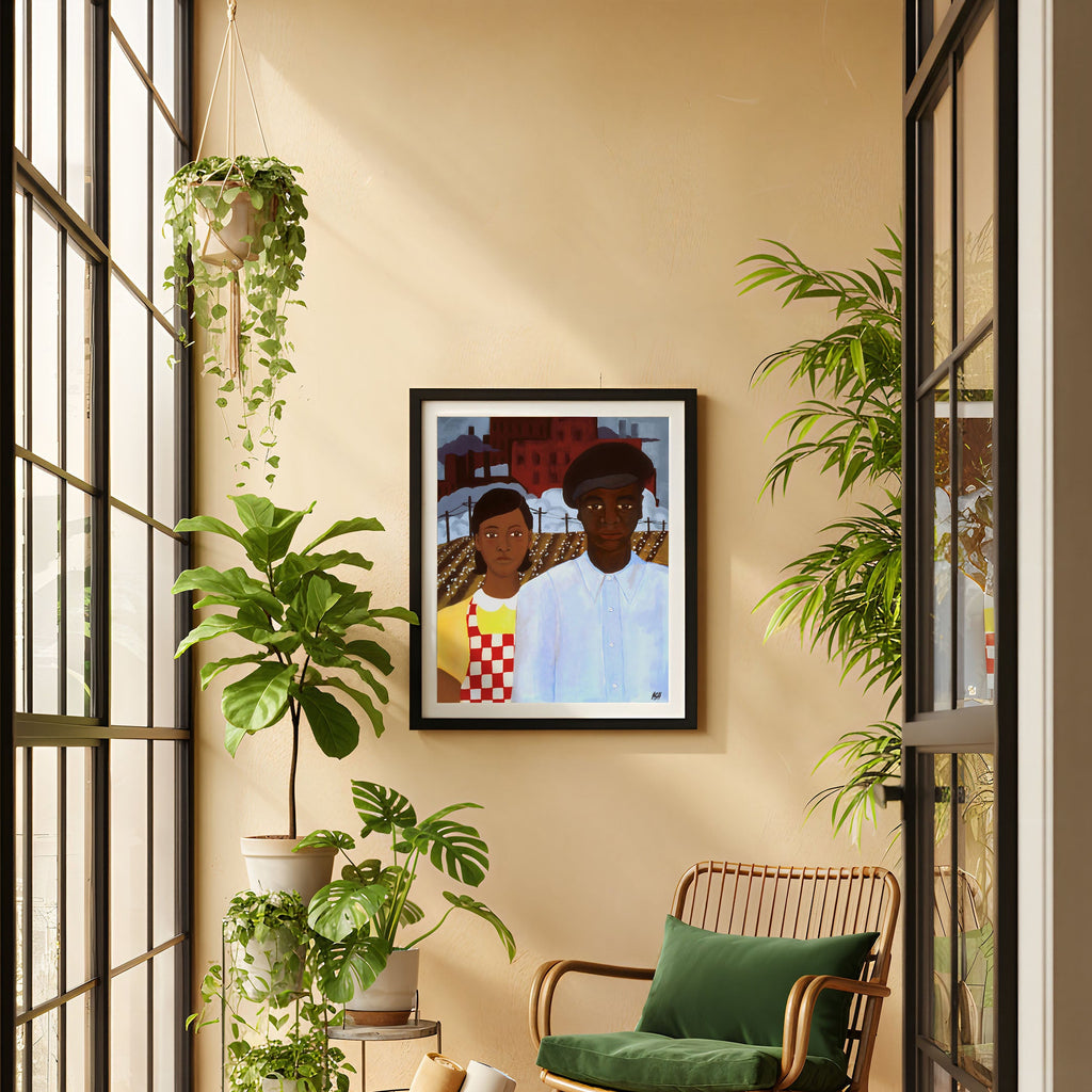 Modern interior with a framed black art print featuring black couple, wooden armchair, green cushions, and decorative plants.