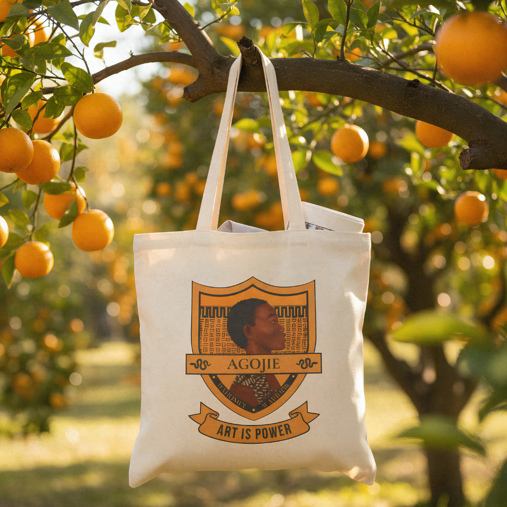 Canvas tote bag featuring Dahomey Warrior artwork, summer lifestyle setting