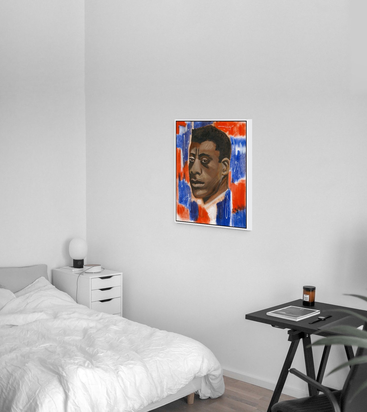 Framed stretched canvas print of 'Red, White & Blues - James Baldwin,' elegantly framed in white. The artwork depicts Baldwin against a striking red, white, and blue background, celebrating his influential legacy in literature and civil rights, with the white frame providing a crisp, modern finish.