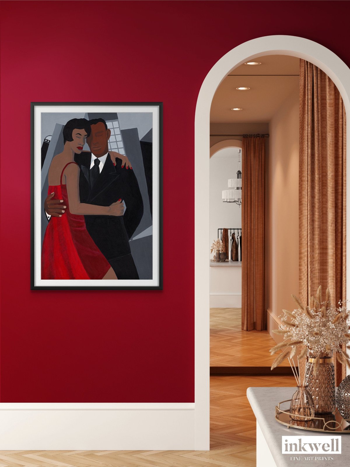 'Night on the Town' art print: Elegantly dressed couple, woman in a red dress and man in a black suit, embracing against a stylized urban backdrop with abstract buildings, capturing a romantic and celebratory evening atmosphere. shown on redwall inelegant hallway