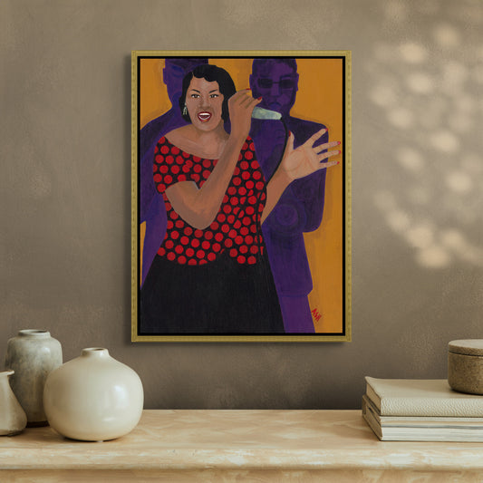 Black art Print - Jazz Singer framed canvas print by Antionette Simmons Hodges. Depicts an African American woman in a red polka-dot dress, passionately singing with a microphone, set against a vibrant orange and purple backdrop, celebrating jazz music.