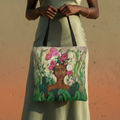 Woman holding the Mother Nature Art Tote Bag featuring a floral crown portrait by Antionette Simmons Hodges