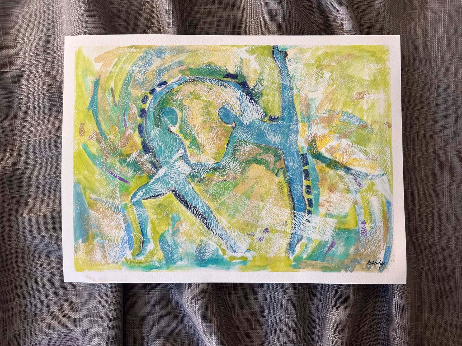 Motion in Teal' art print: Abstract expressionist painting featuring swirling teal hues interwoven with lime green, copper, blues, and white, depicting dynamic movement and dance elements, with abstract forms of dancers emerging from the brushstrokes. shown with border around the print on gray fabric