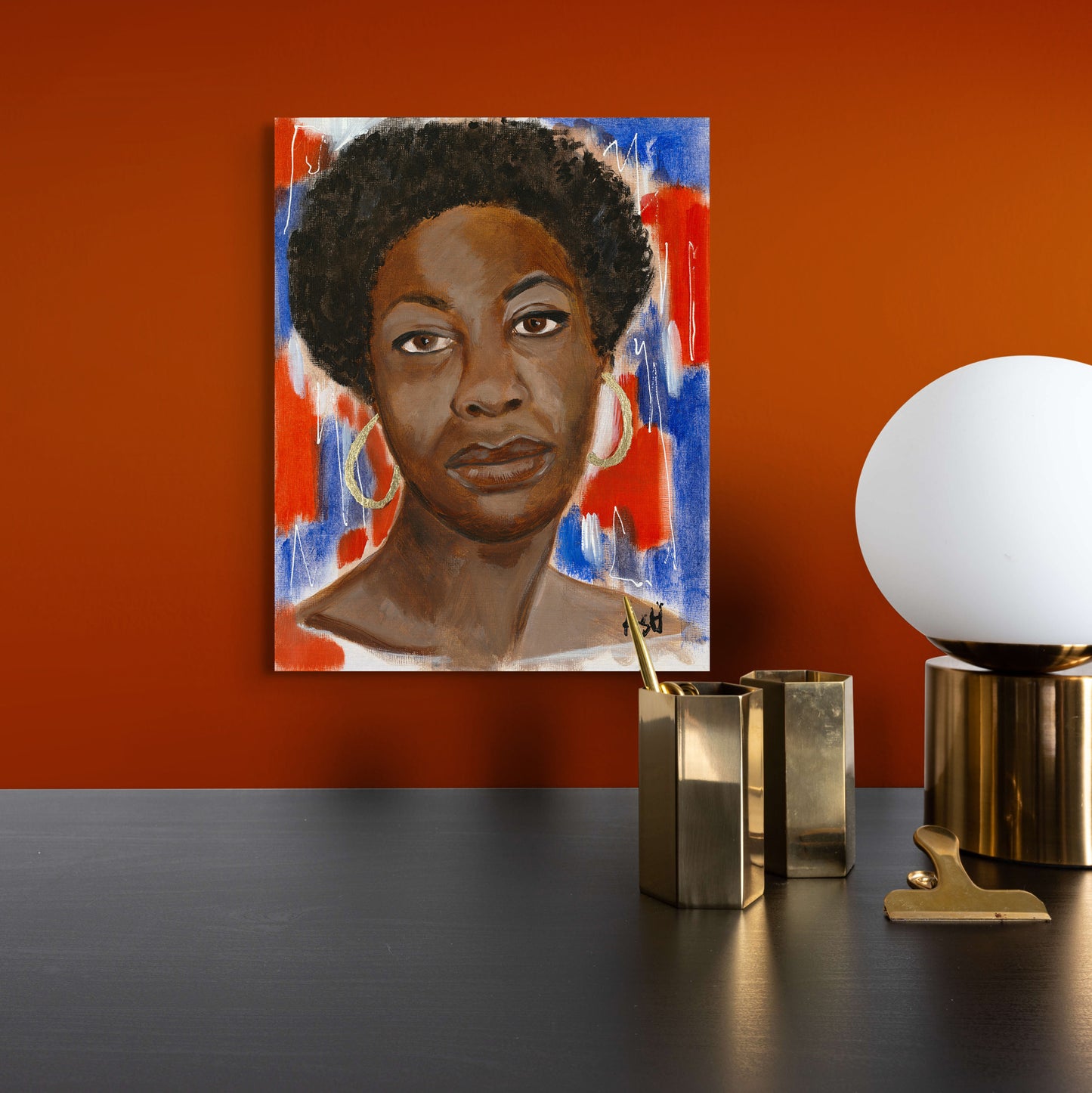 Stretched canvas print of Nina Simone, featuring vibrant red, white, and blue hues. The artwork captures her powerful presence and legacy in music and civil rights, with bold colors symbolizing both patriotism and the emotional depth of the 'blues