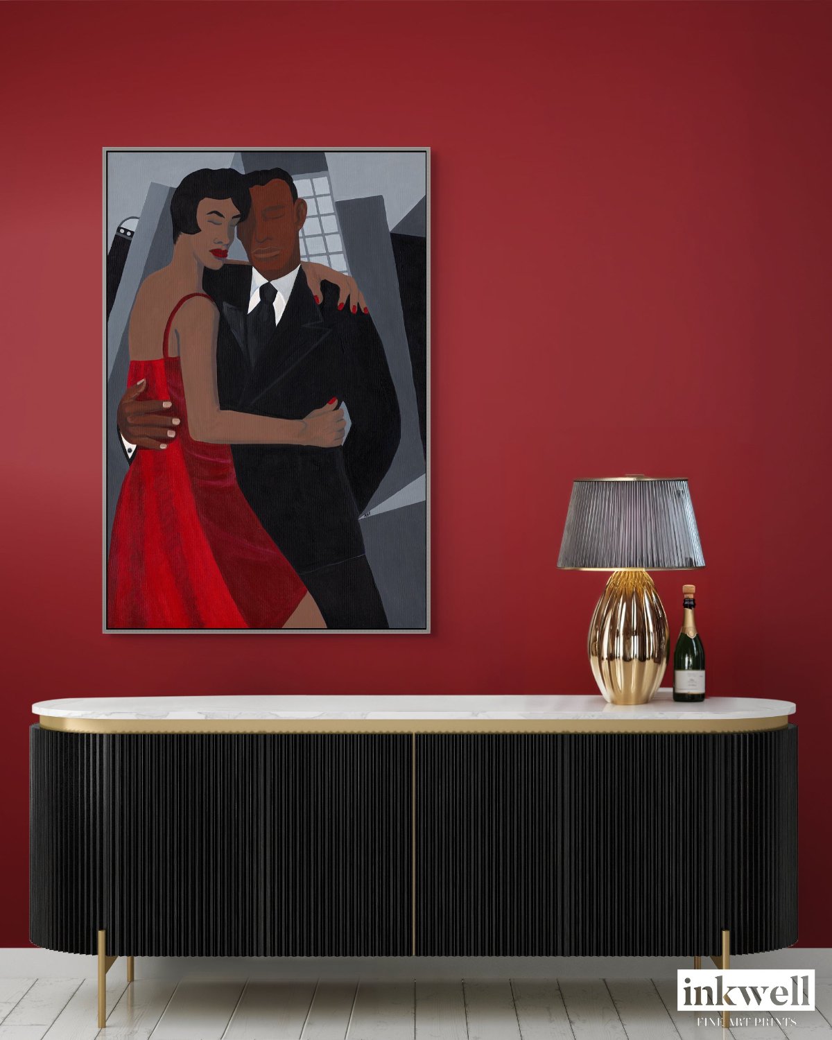 Night on the Town' art print: Elegantly dressed couple, with the woman in a red dress and the man in a black suit, embracing against a stylized urban backdrop with abstract buildings, capturing a romantic and celebratory evening atmosphere, framed in silver wood.