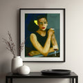 Framed painting of a black woman with a glass of wine on a wall above a table with decorative items.