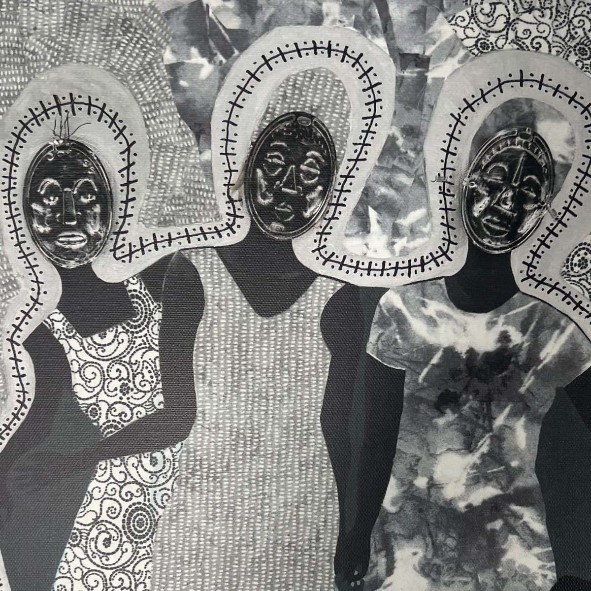 Detail of African American art print 'Mirror Mirror' by Antionette Simmons Hodges on Gray Fabric,  depicts 3 woman with Afrocentric faces