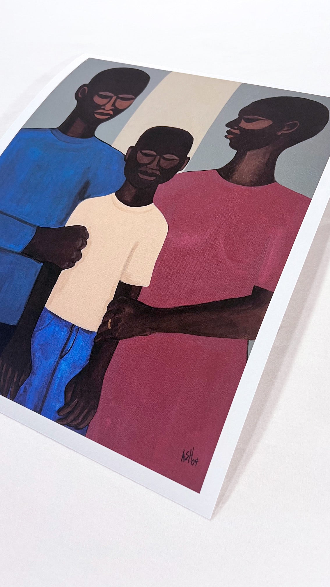 'The Family' fine art print: Stylized depiction of an African American family, with two adults and a child, set against a muted background, symbolizing unity and strength. shown with white border