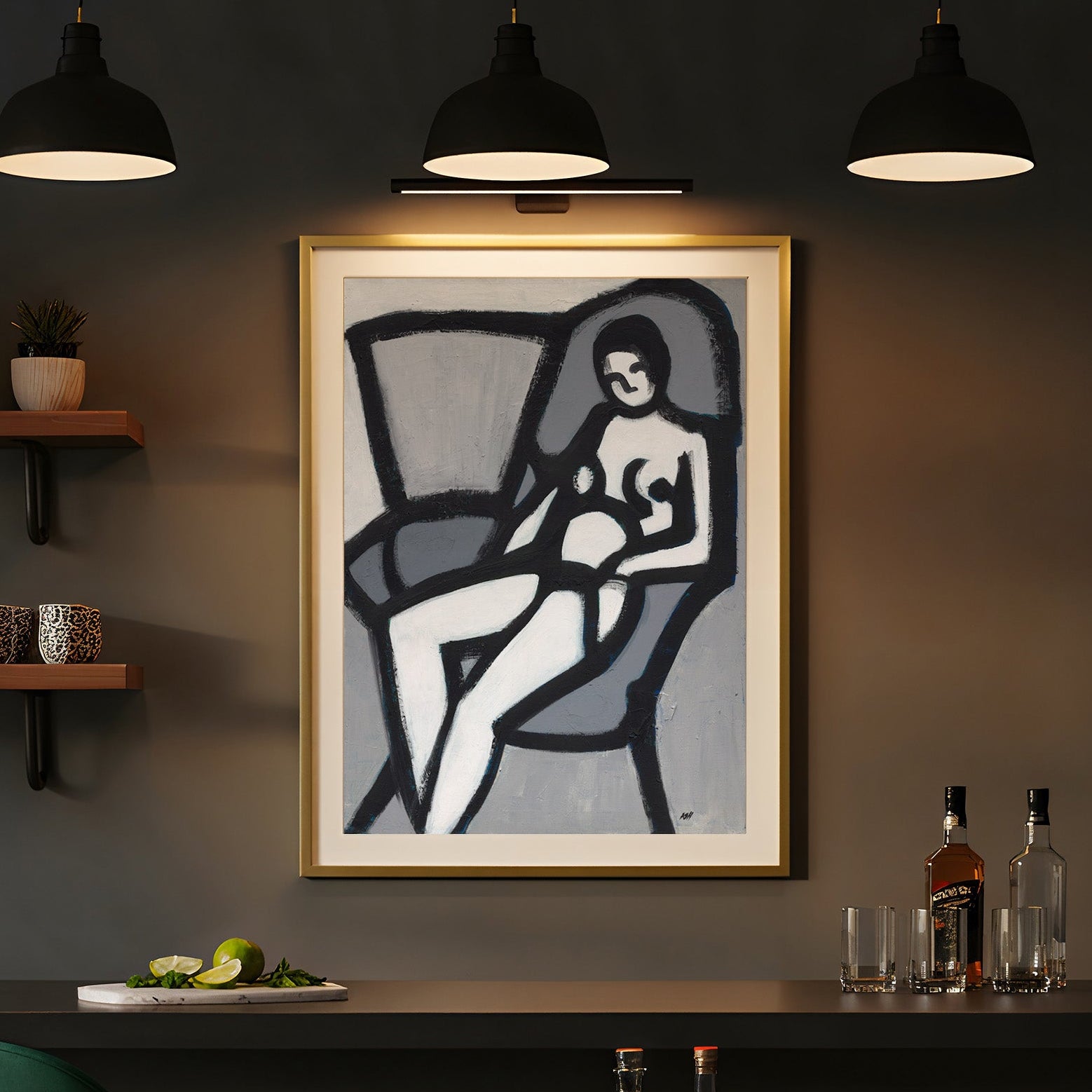 Dark bar area with a green chair, framed nude model artwork in gray, black and white, and bar cart.