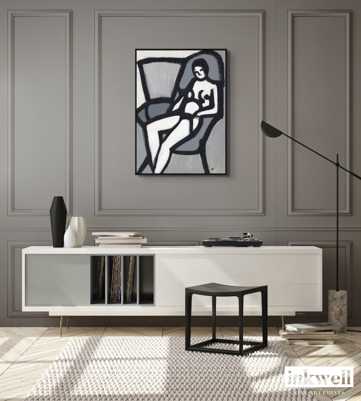 'The Model' art in frame: Expressionistic black and white painting of a stylized female figure, highlighted by bold brushstrokes and enclosed in a refined frame.