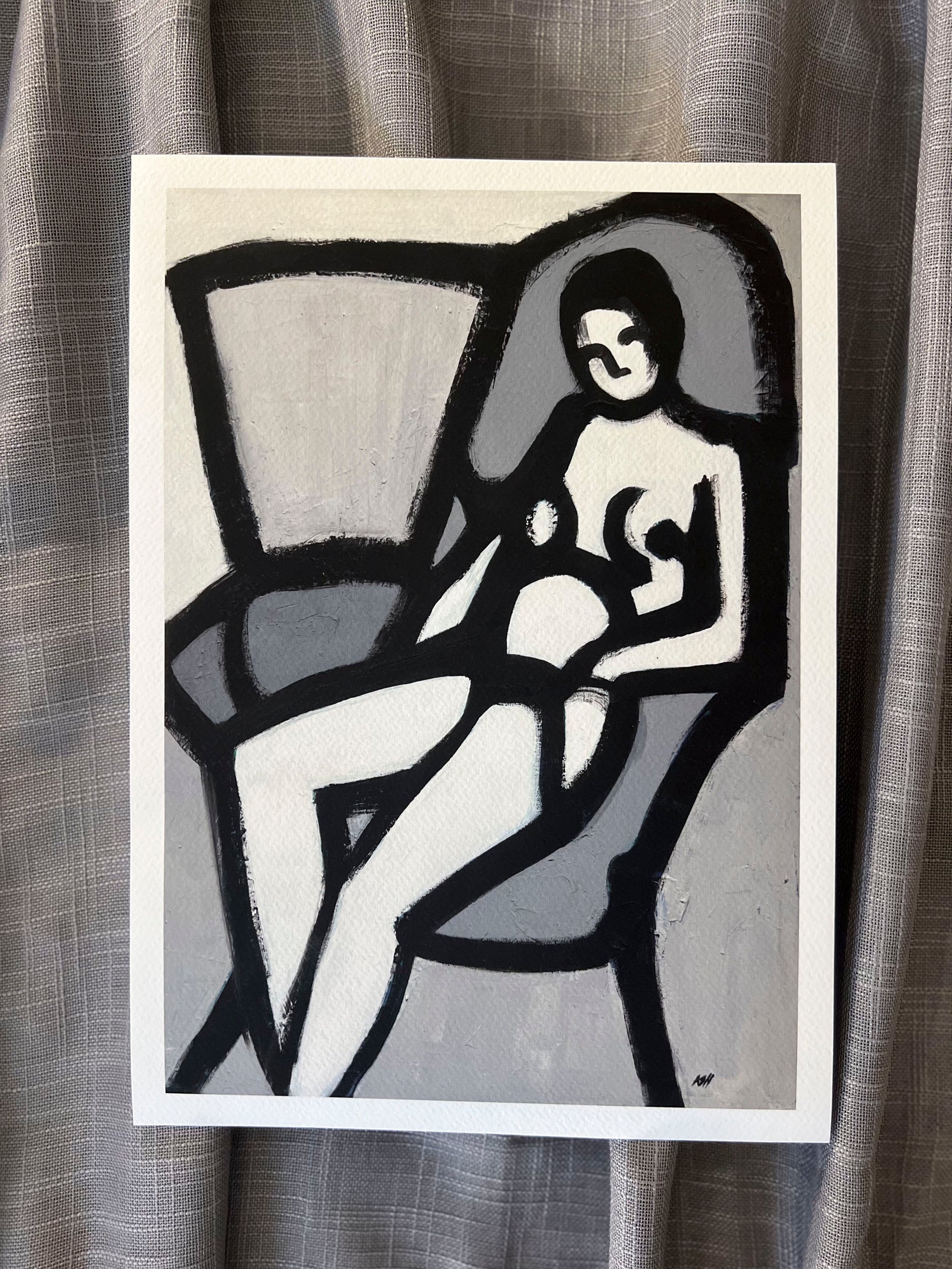 'The Model' art print: Black and white painting featuring a stylized female nude figure in a chair, highlighted by angular forms and dynamic brushwork in an expressionistic style.